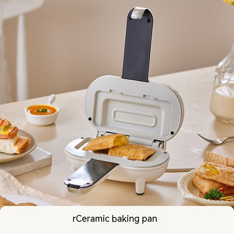 UK 3-pin plug attached to compact breakfast machine for home use